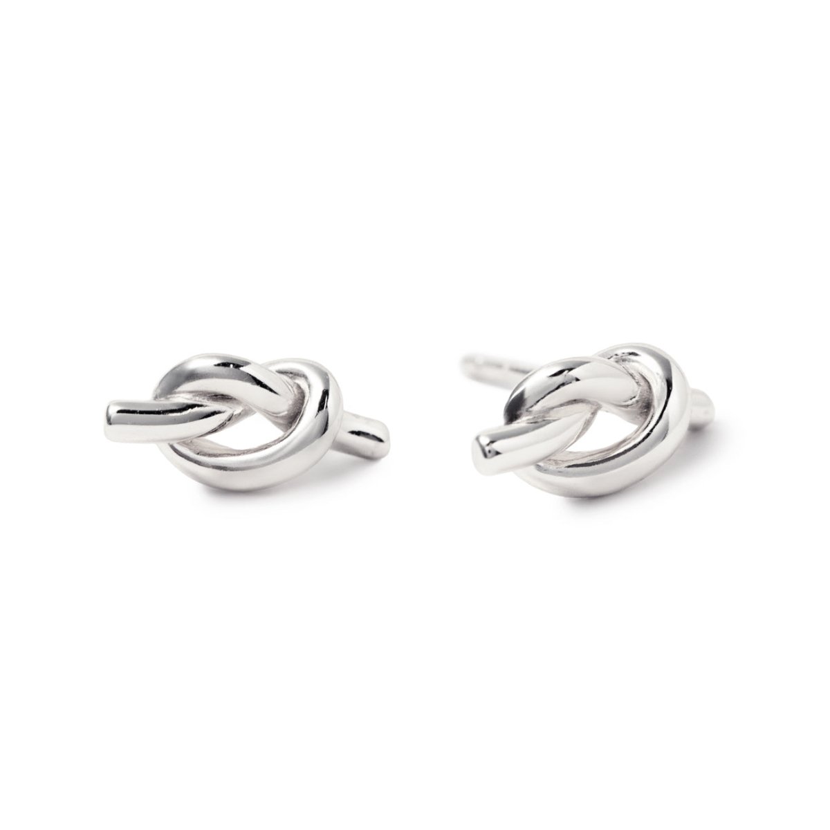 Sterling silver knot stud earrings with a polished love-knot design, on a white background