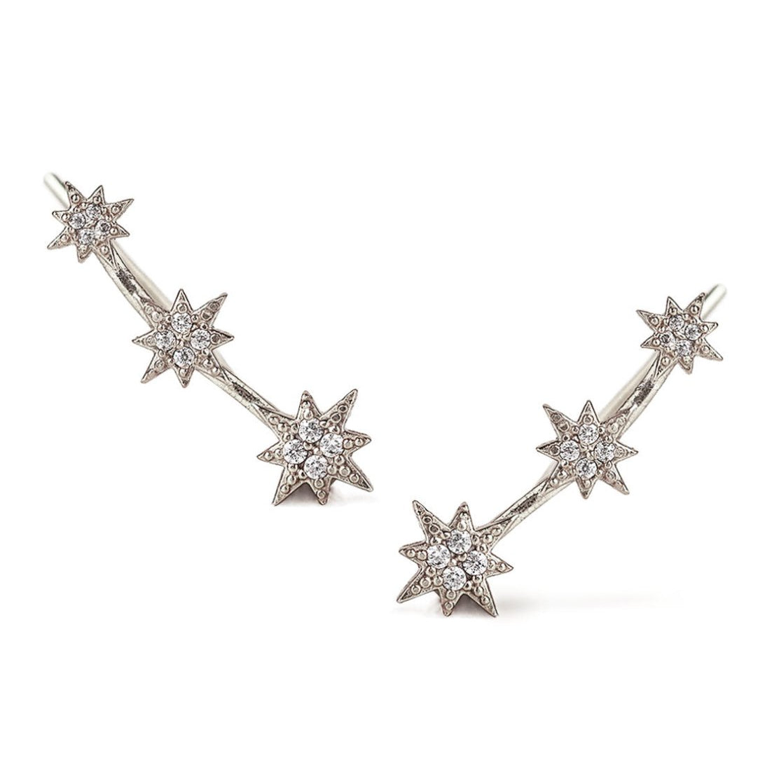 Pair of sterling silver six-point star ear climbers pave-set with white zirconia, on a white background