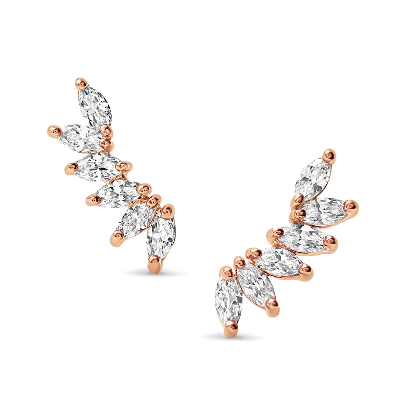 Rose gold vermeil wing climber earrings with marquise white zirconia stones, on a white background