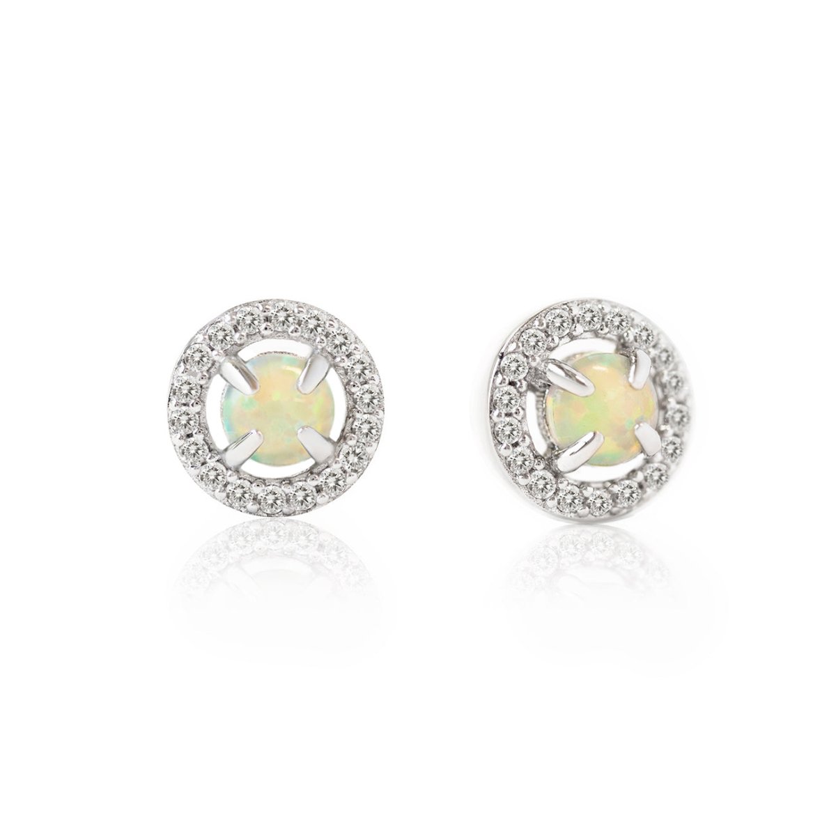 Sterling silver opal halo studs with a clear pavé surround, on a white background