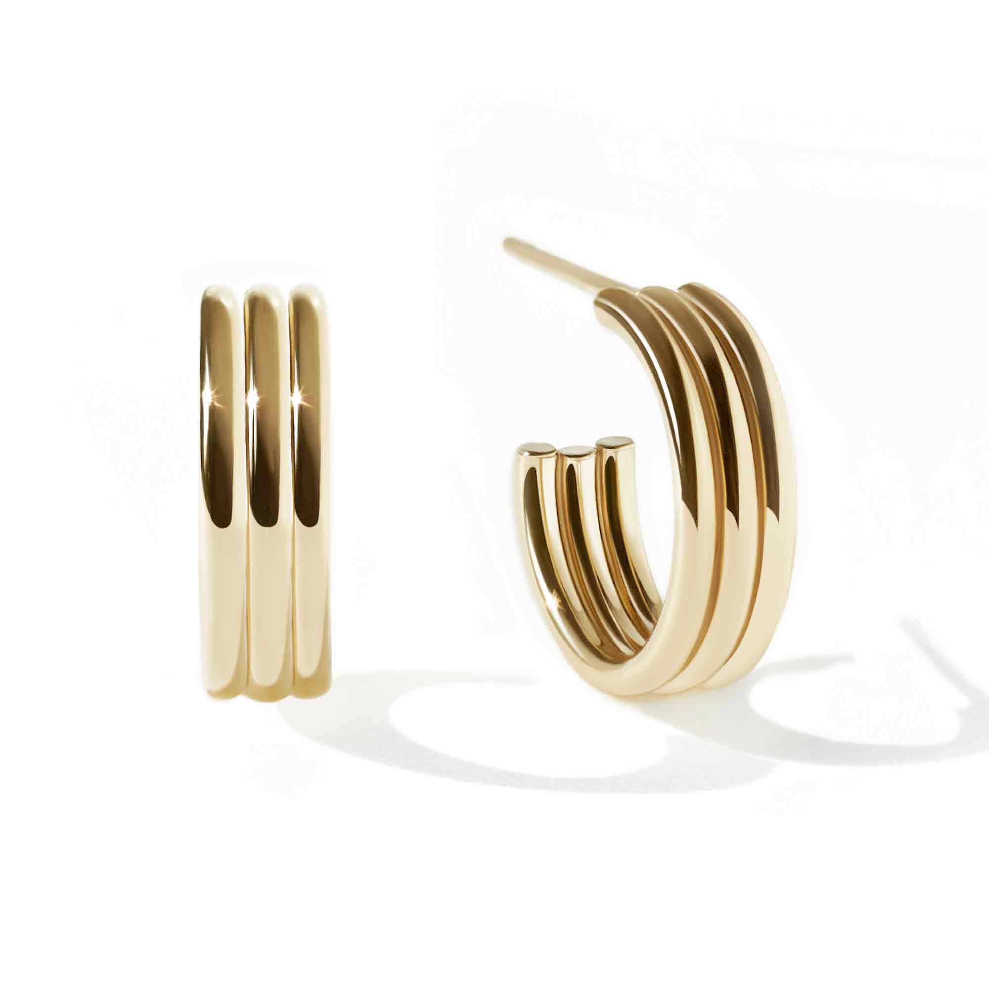 Gold-filled triple-ridge hoop earrings shown front and side, on a white background
