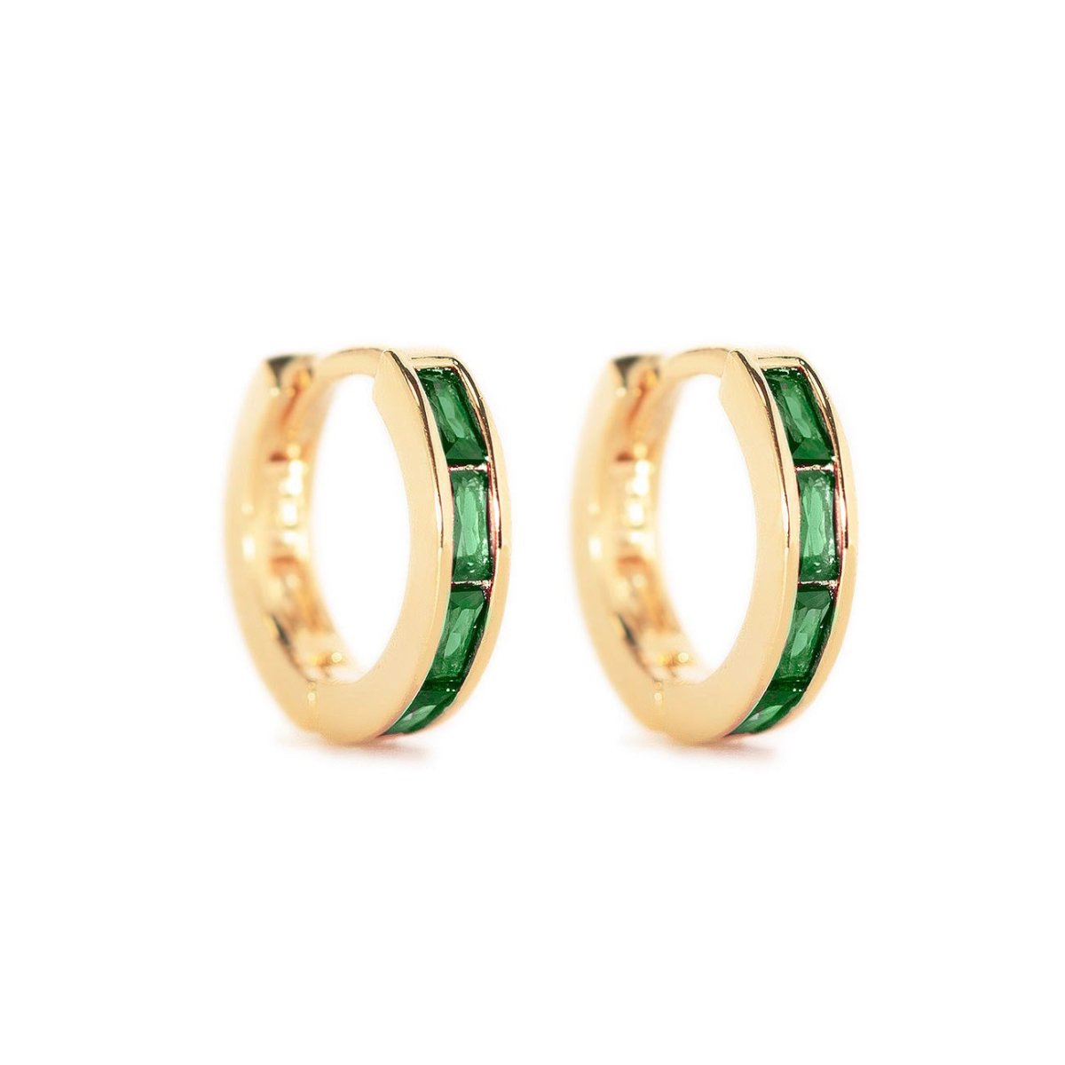 Gold vermeil huggie hoops with channel-set green baguette stones, shown as a pair on a white background