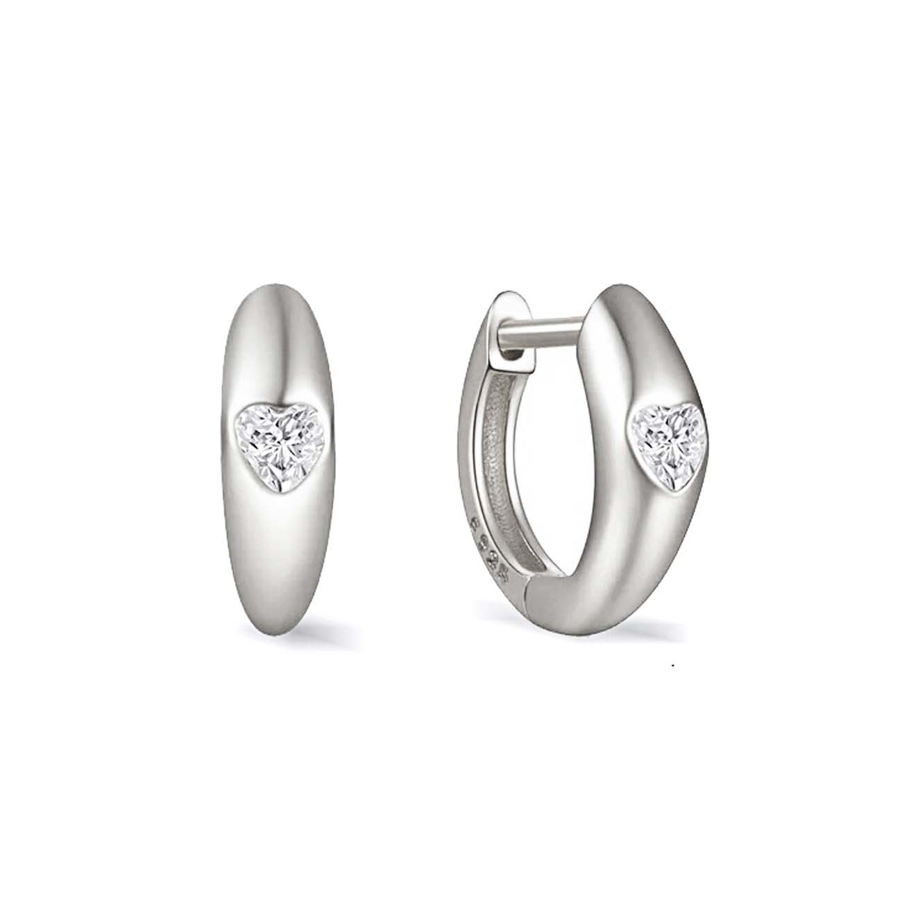 Sterling silver heart huggie hoops with a white zirconia heart inlay, on a white background