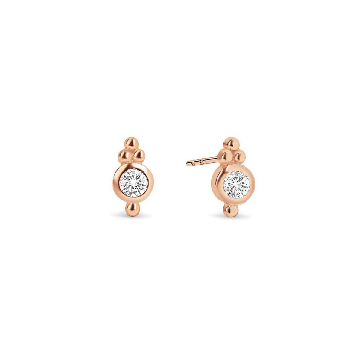 Rose gold vermeil bezel stud earrings with a round clear zirconia and beaded accents, on a white background