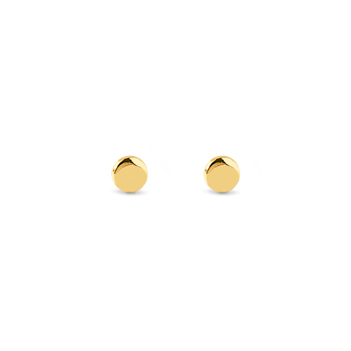 Gold vermeil tiny circle stud earrings, on a white background