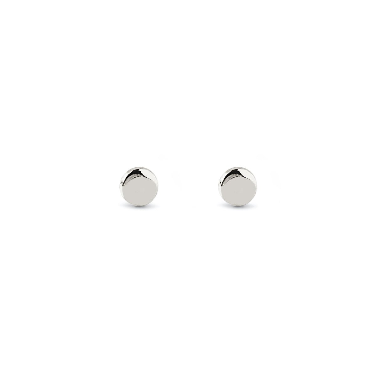 Sterling silver tiny circle stud earrings, on a white background