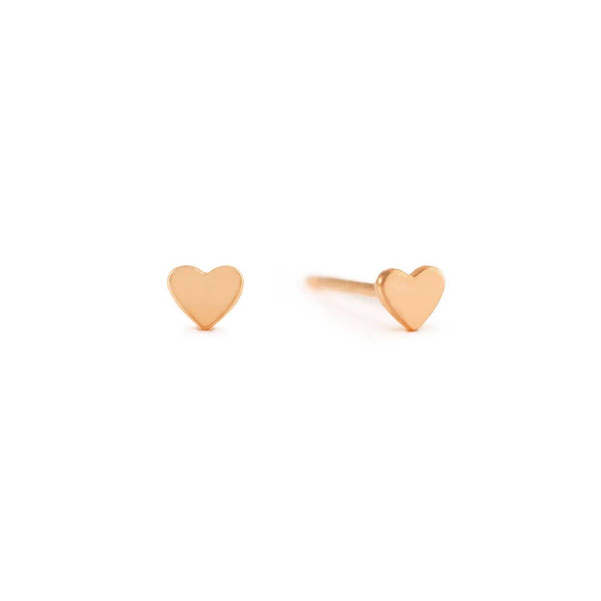 Rose gold vermeil tiny heart stud earrings shown as a pair on a white background