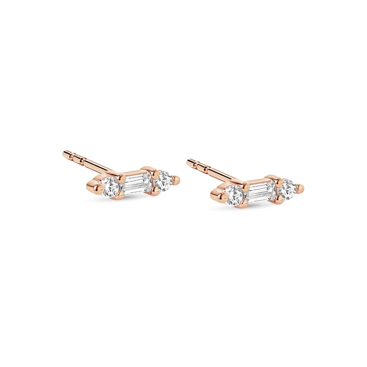 Pair of rose gold vermeil bar studs with a clear baguette and two round stones, on a white background