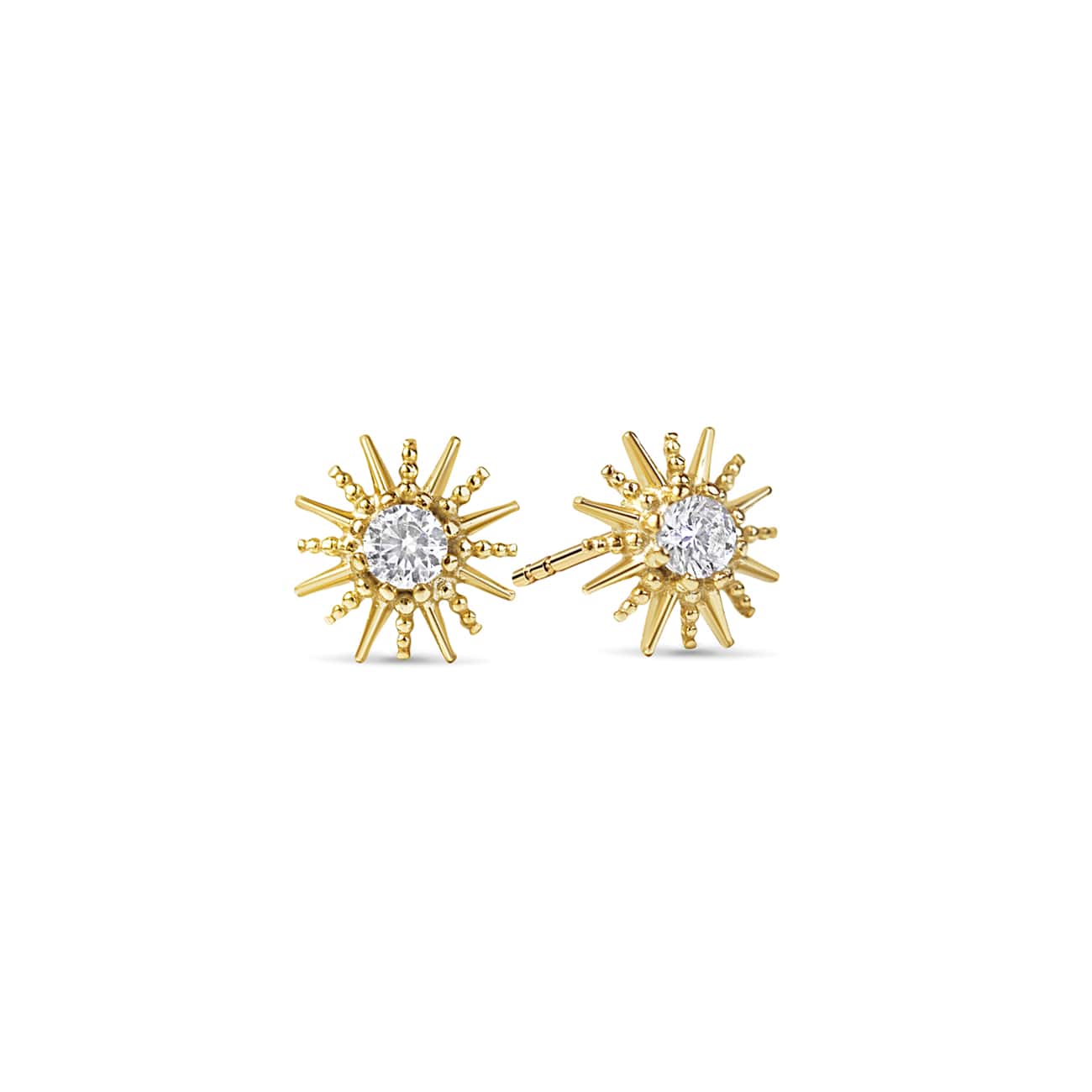 Pair of gold vermeil starburst stud earrings with a round clear crystal center, on a white background