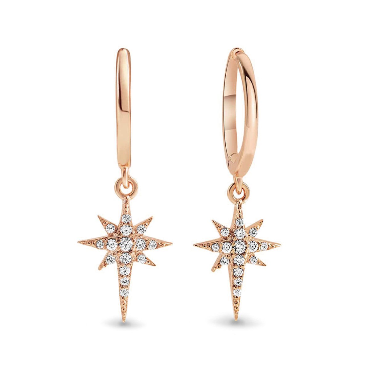 Rose gold vermeil starburst huggie hoops with white zirconia pave star drops, on a white background