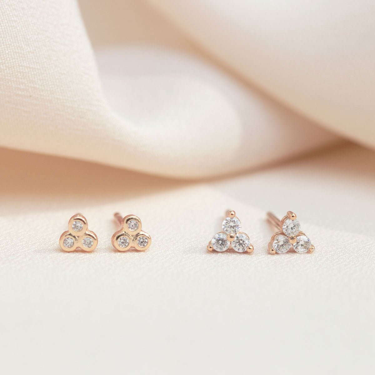 Close up on earrings featuring Rose Gold Vermeil Clover Stud Earrings