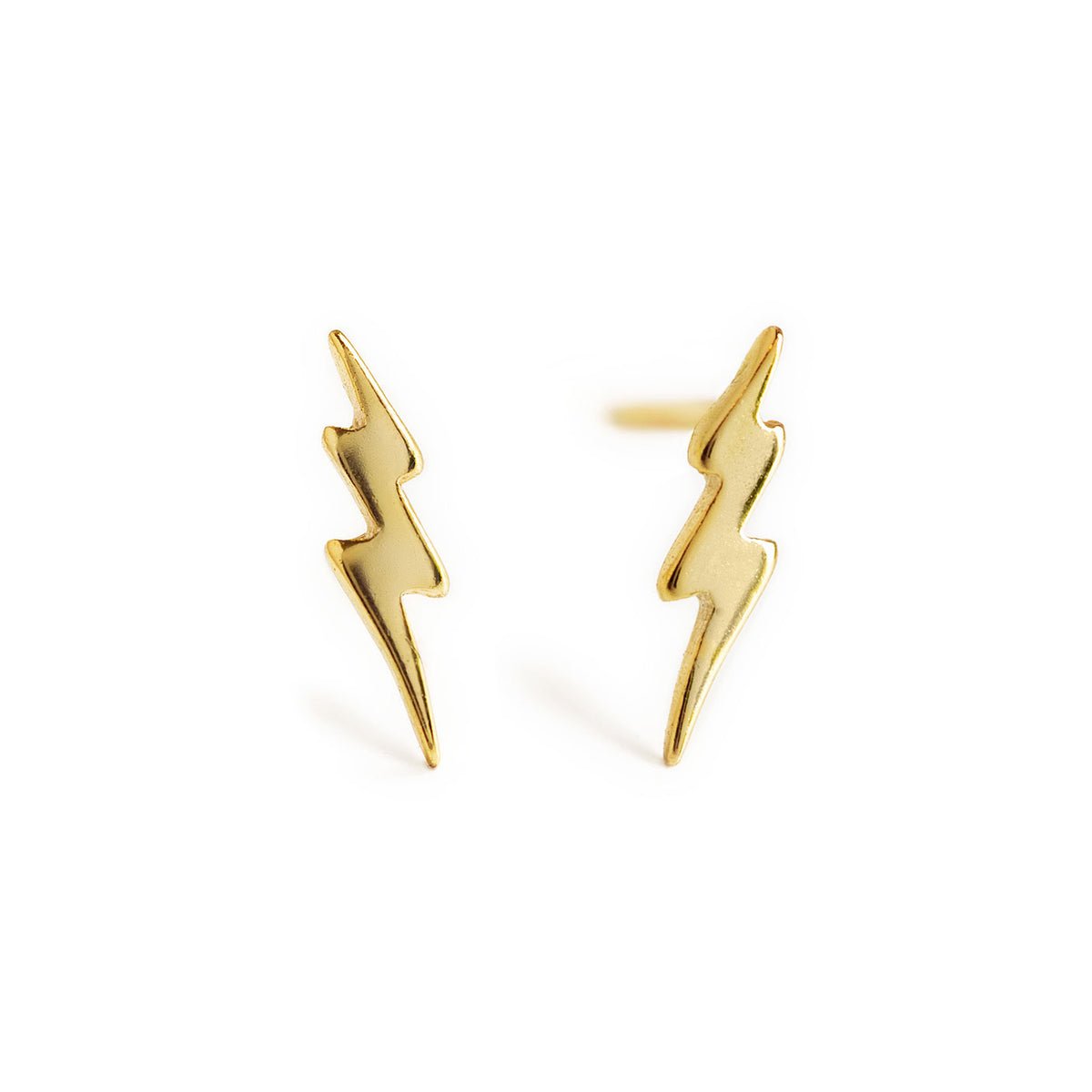 Gold vermeil tiny lightning bolt stud earrings shown as a pair, on a white background