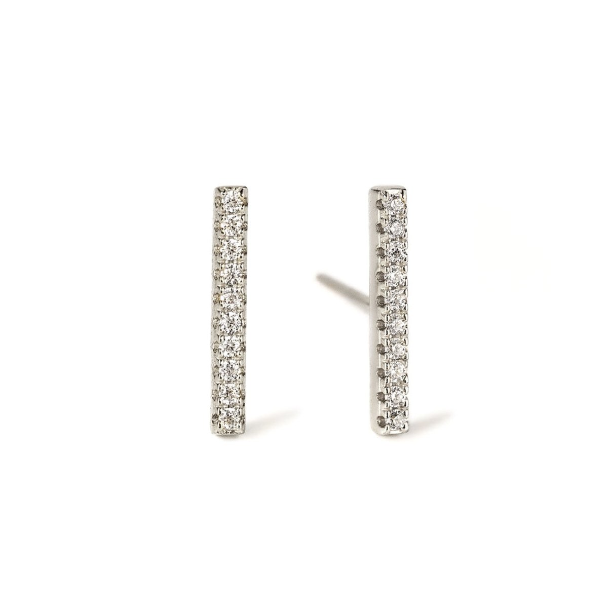 Sterling silver pavé bar stud earrings set with rows of zirconia, on a white background
