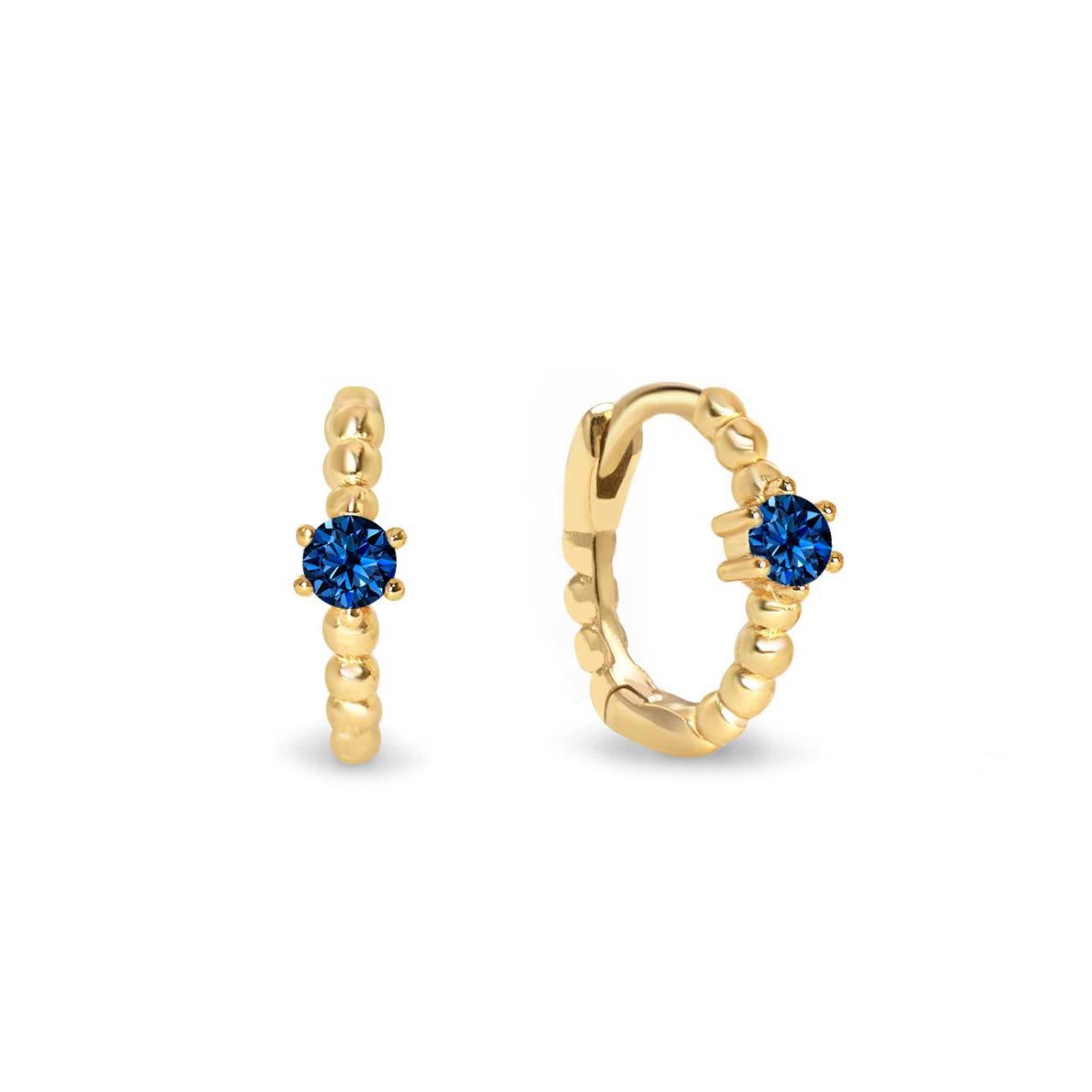 Gold vermeil beaded huggie hoops with a round blue sapphire, front and angled views on a white background