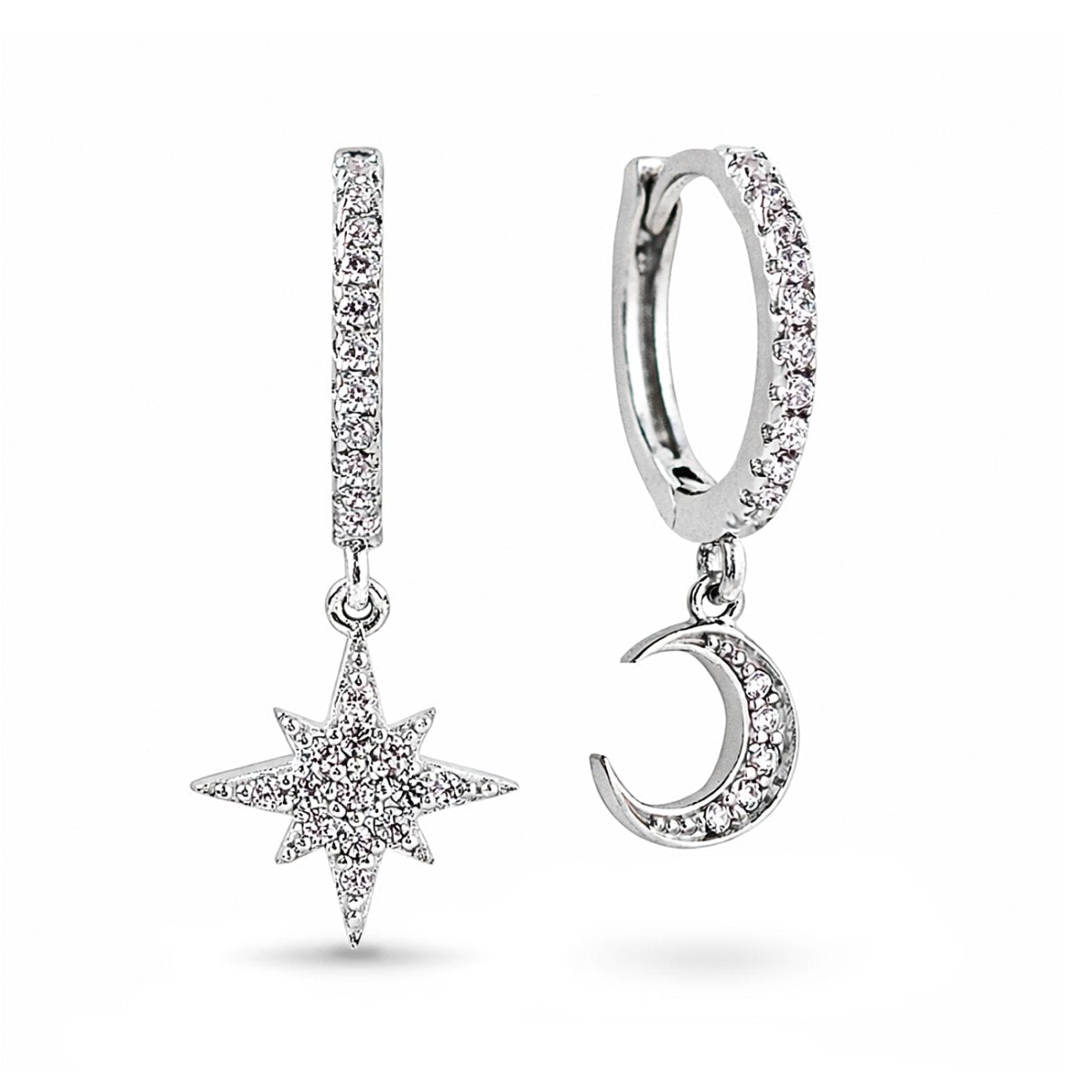 Sterling silver pavé huggie hoops with dangling star and crescent moon charms, on a white background