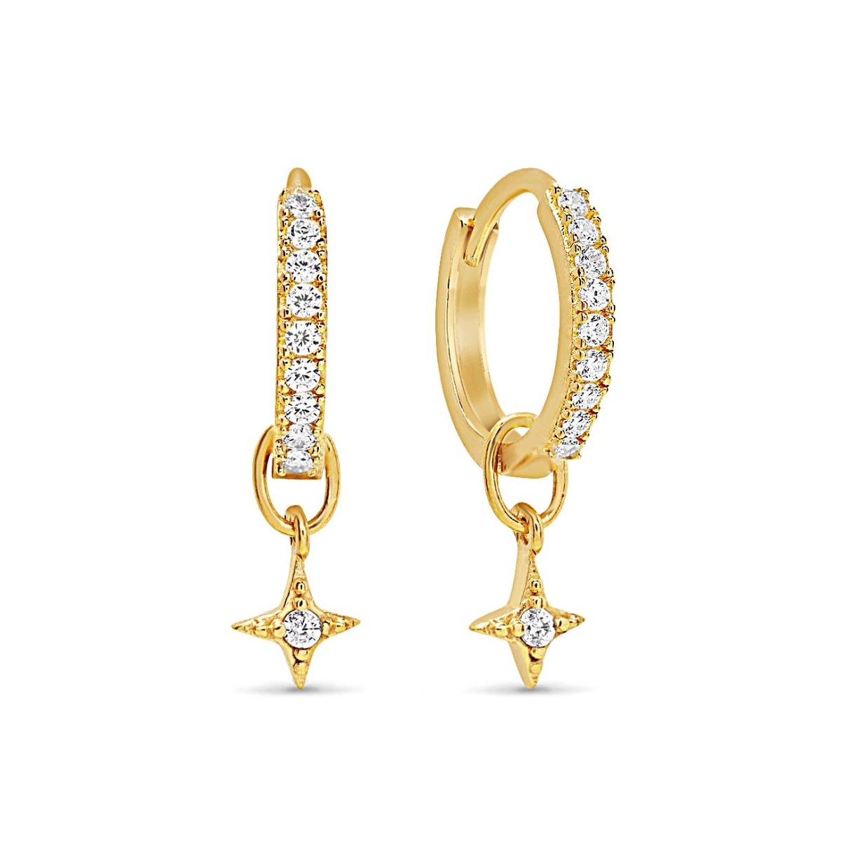 Gold vermeil pavé huggie hoops with hanging starburst charms set with clear stones, on a white background