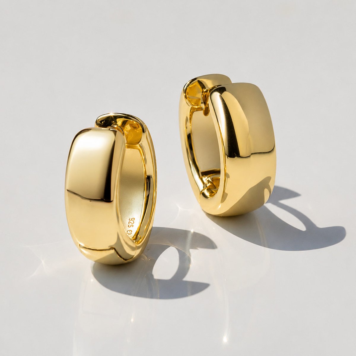 Gold vermeil chunky boyfriend mini hoop earrings, close-up detail