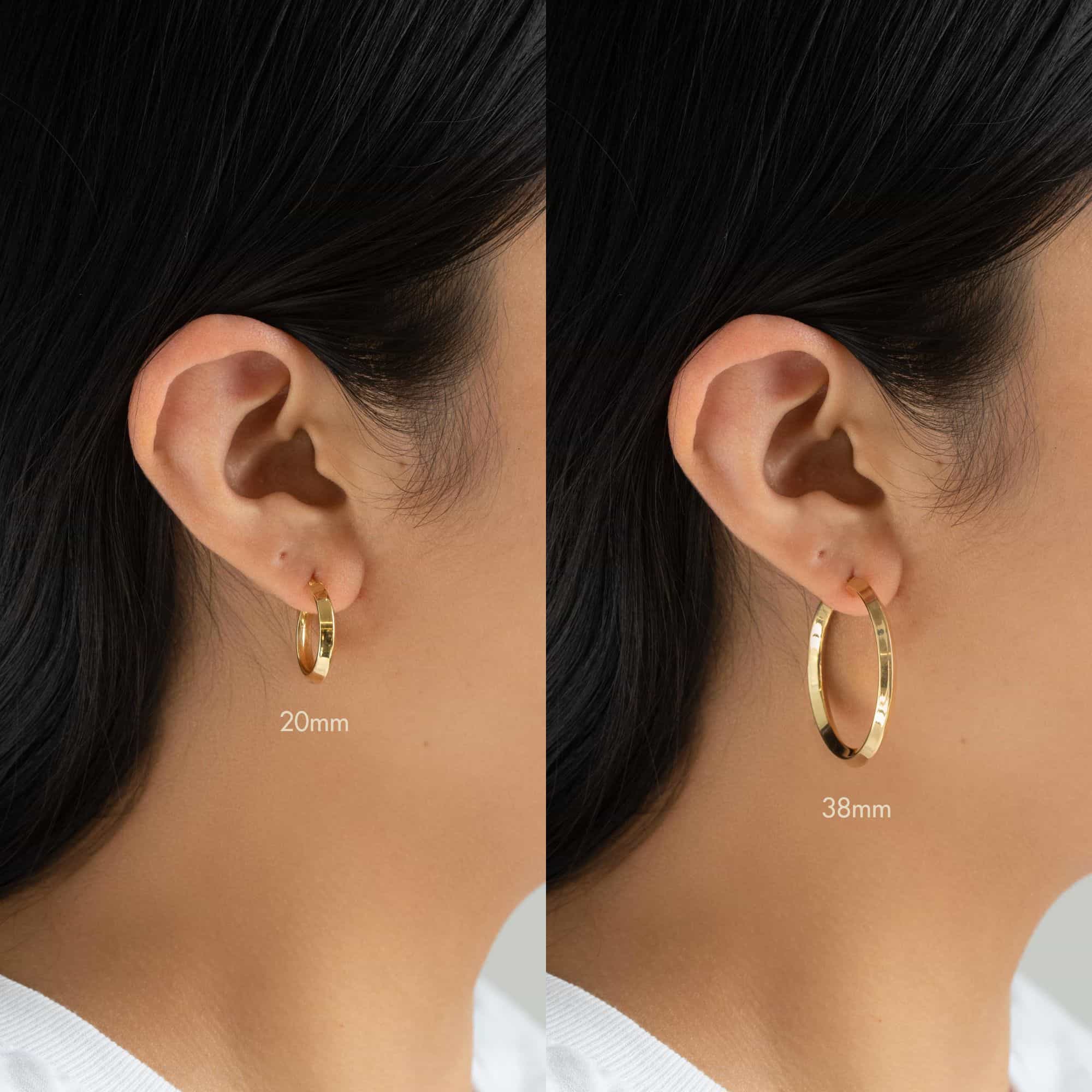 Gold vermeil mini hoop shown on a model's lobe, styled in an ear stack with pavé pieces