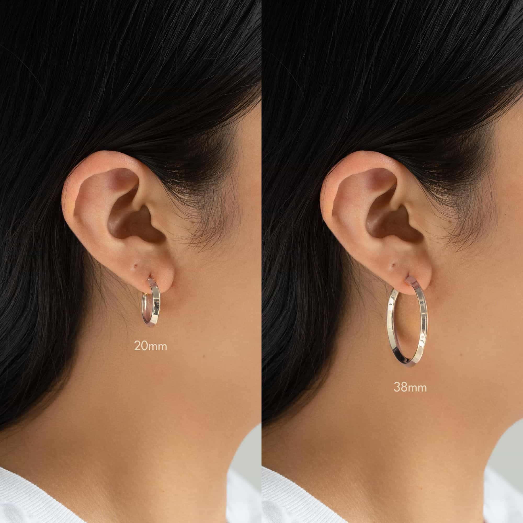 Sterling silver flat-edge hoop earrings shown in graduated sizes on a white background