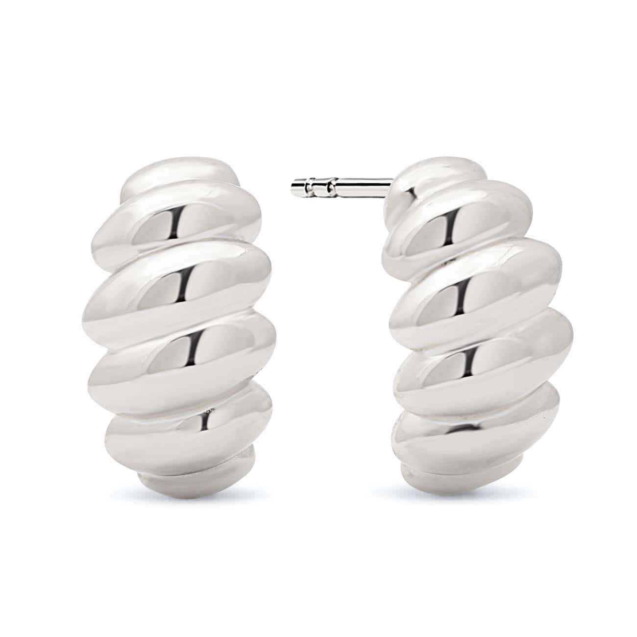 Sterling silver croissant dome stud earrings with a twisted ridged half-hoop shape, on a white background