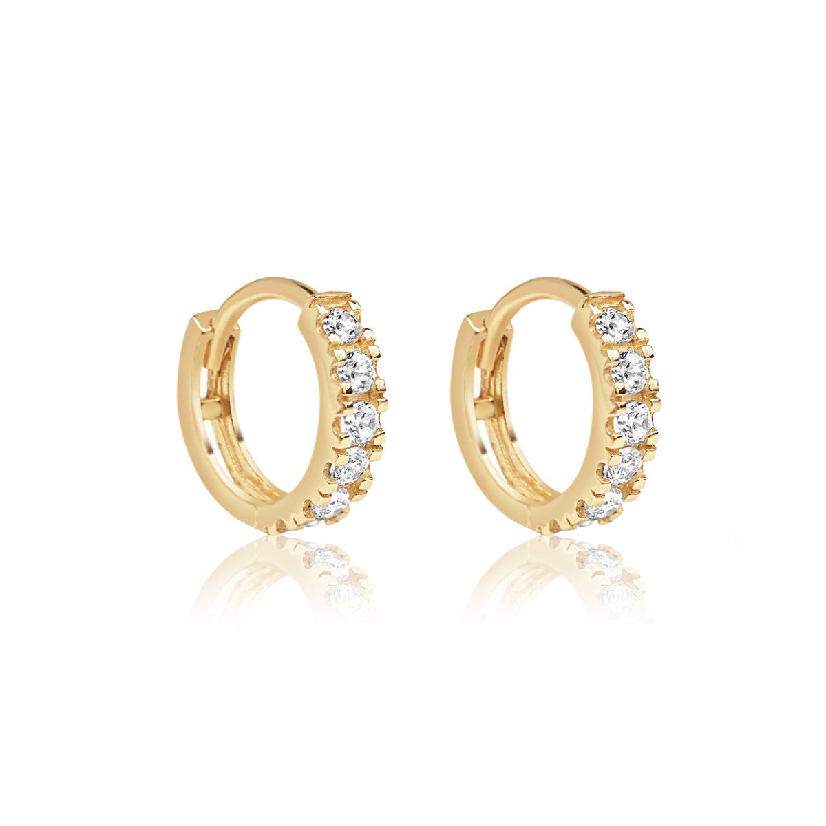 Pair of 14K gold diamond pave huggie hoops with prong-set stones, on a white background