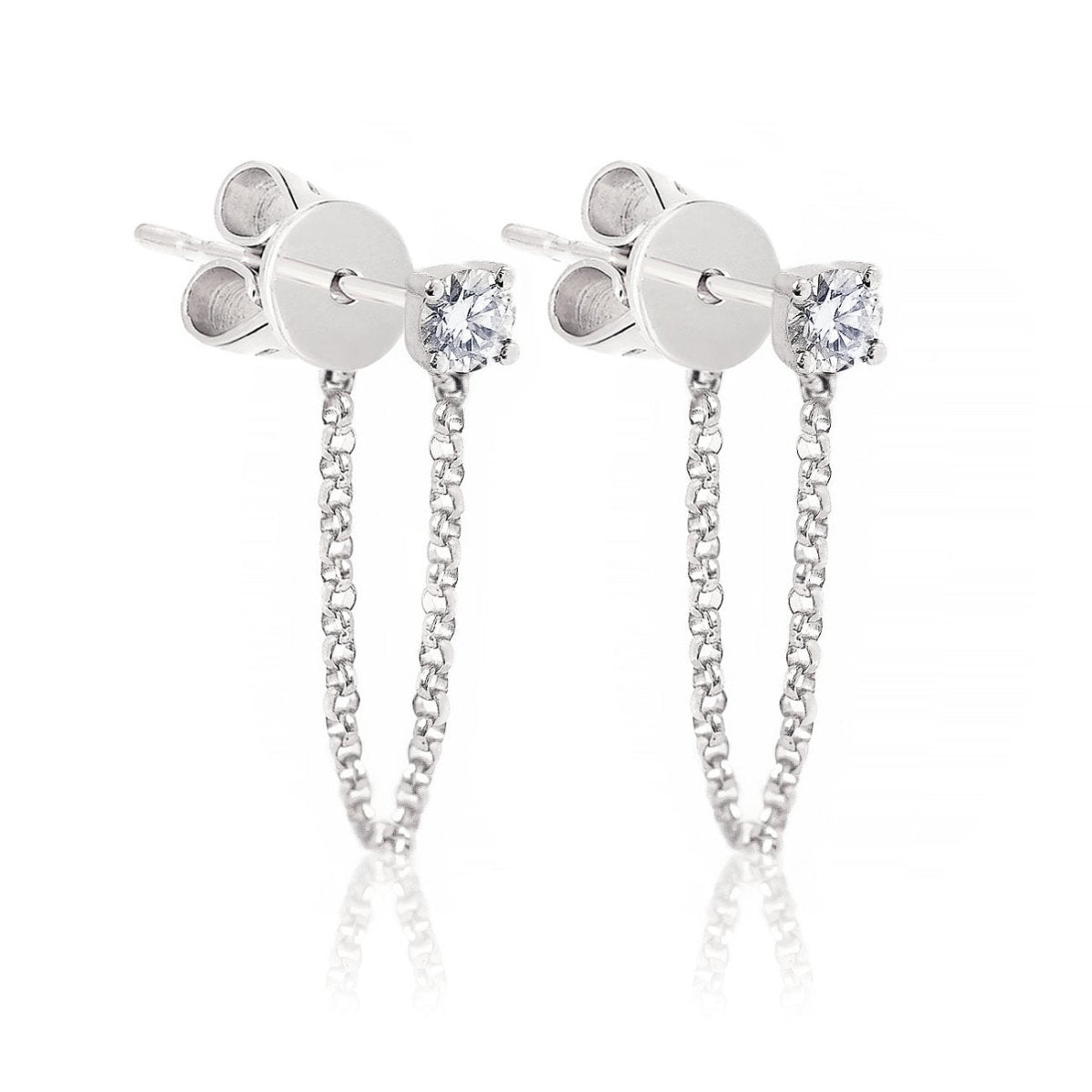 Pair of 14K white gold natural diamond stud earrings with a draped back chain, on a white background