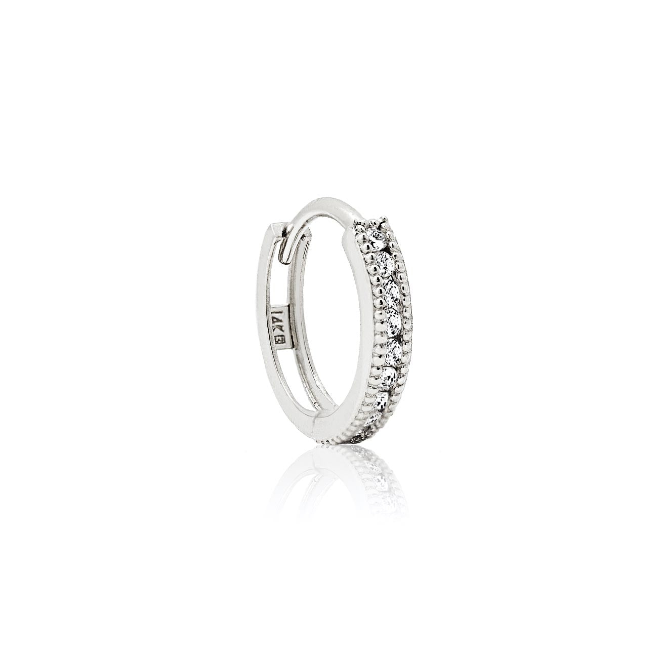 Single 14K white gold milgrain huggie hoop paved with natural diamonds, on a white background