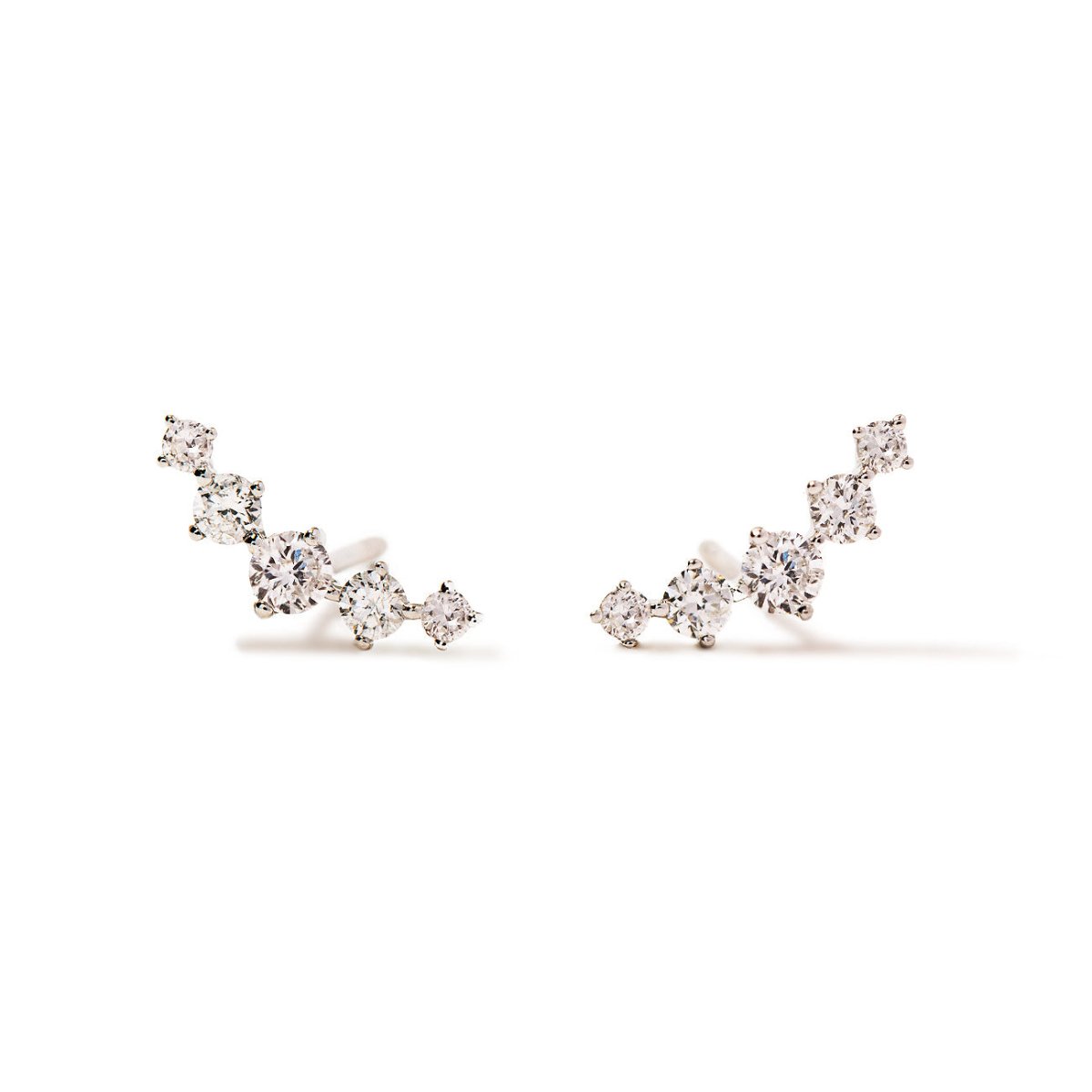 Pair of 14K white gold curved climber studs set with five round diamonds, on a white background