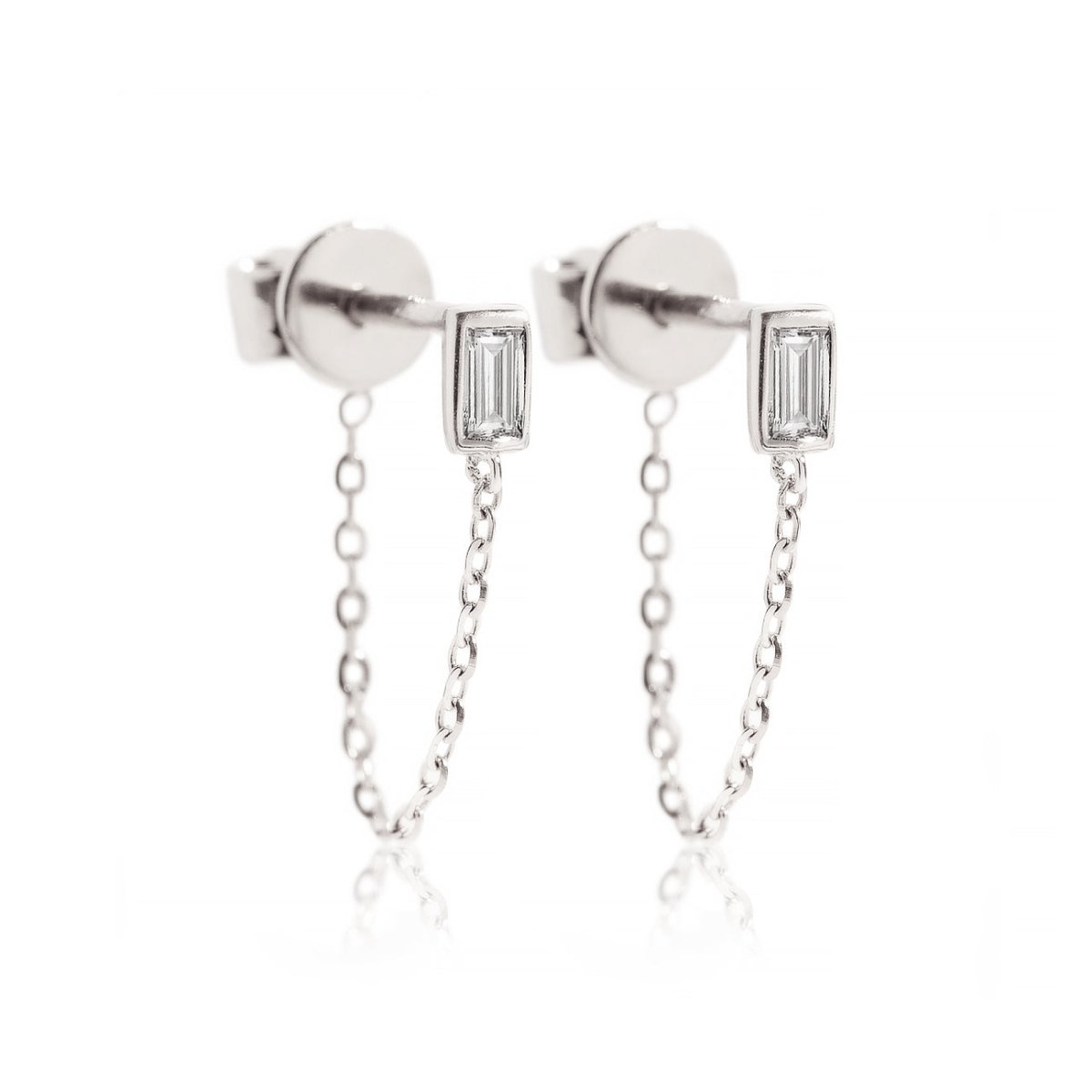 14K white gold chain stud earrings with a baguette natural diamond and draped chain, on a white background