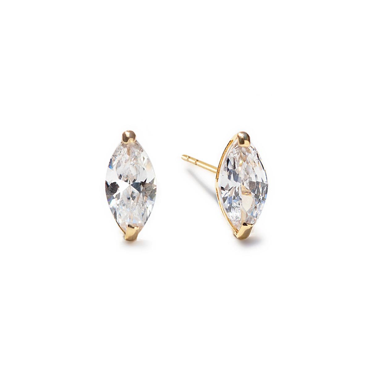 Pair of 14K gold marquise white zirconia stud earrings, on a white background