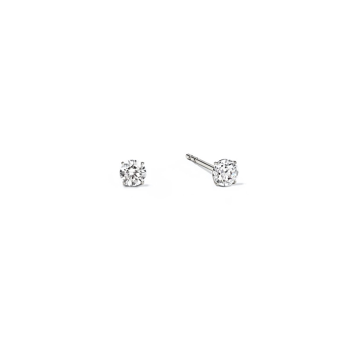 Pair of 14K white gold solitaire studs with round clear white sapphires in prong settings, on a white background