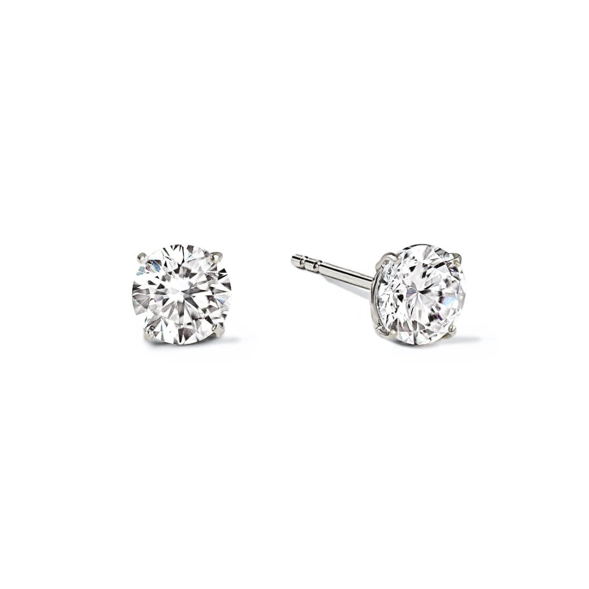 Pair of silver round clear-stone solitaire studs in four-prong settings, on a white background