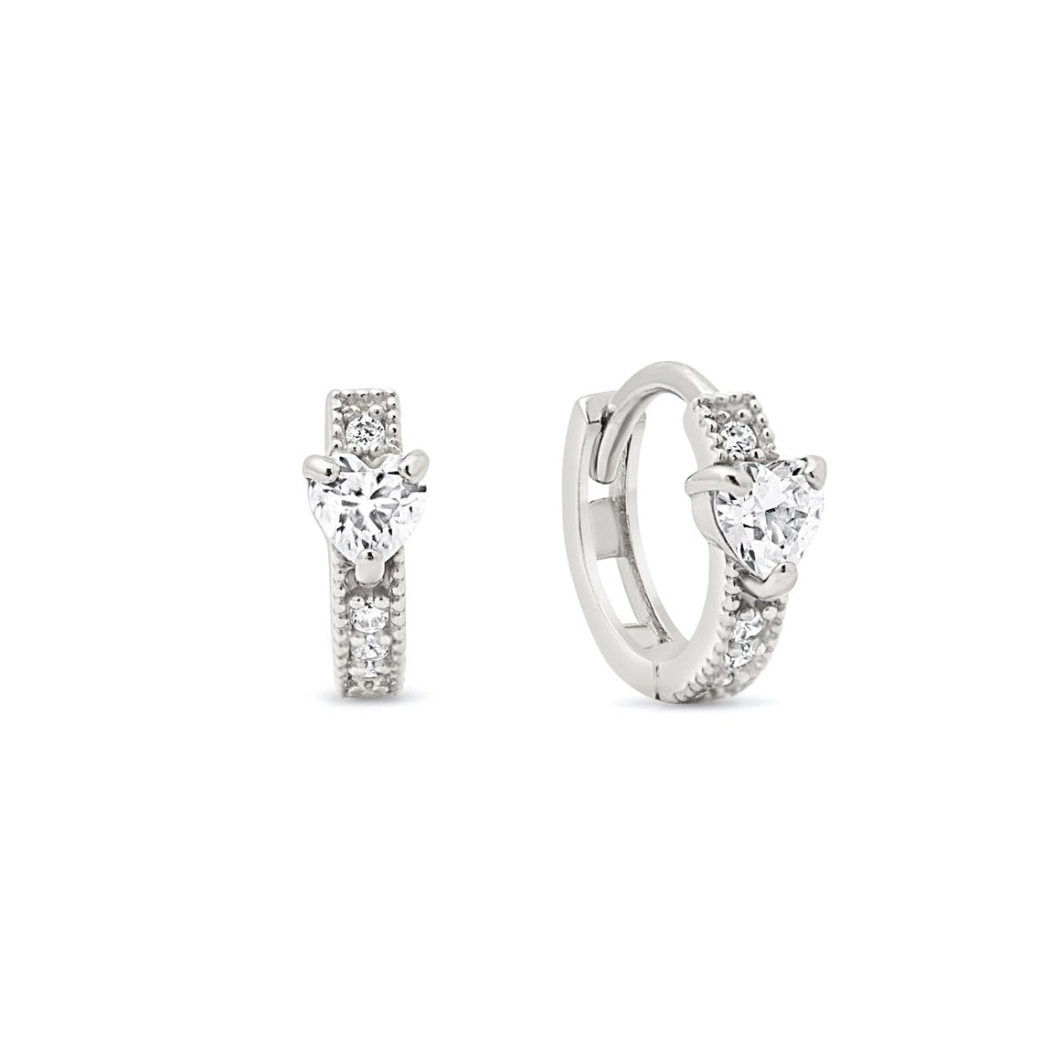 14K white gold heart huggie hoops with a white zirconia heart stone and accent stones, on a white background