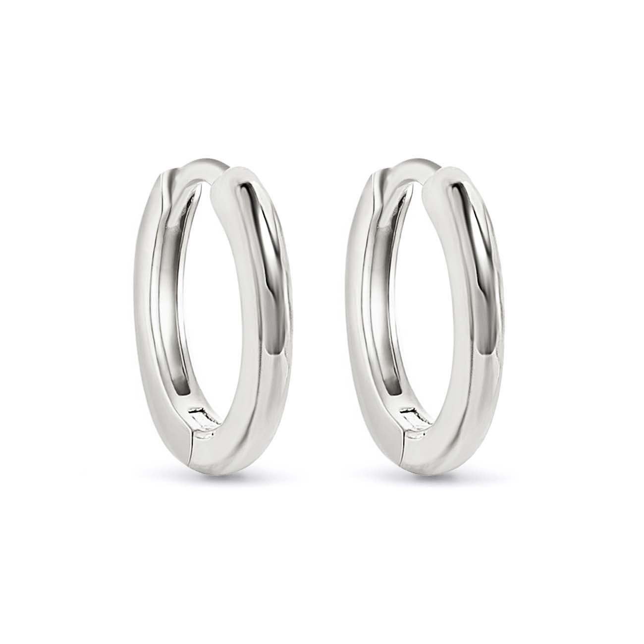 Pair of sterling silver thin mini hoop earrings with a hinged closure, on a white background