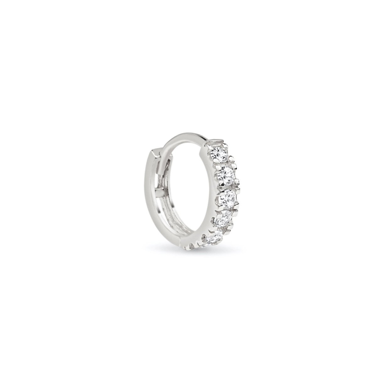 Single 14K white gold pavé huggie hoop with round clear cubic zirconia, on a white background