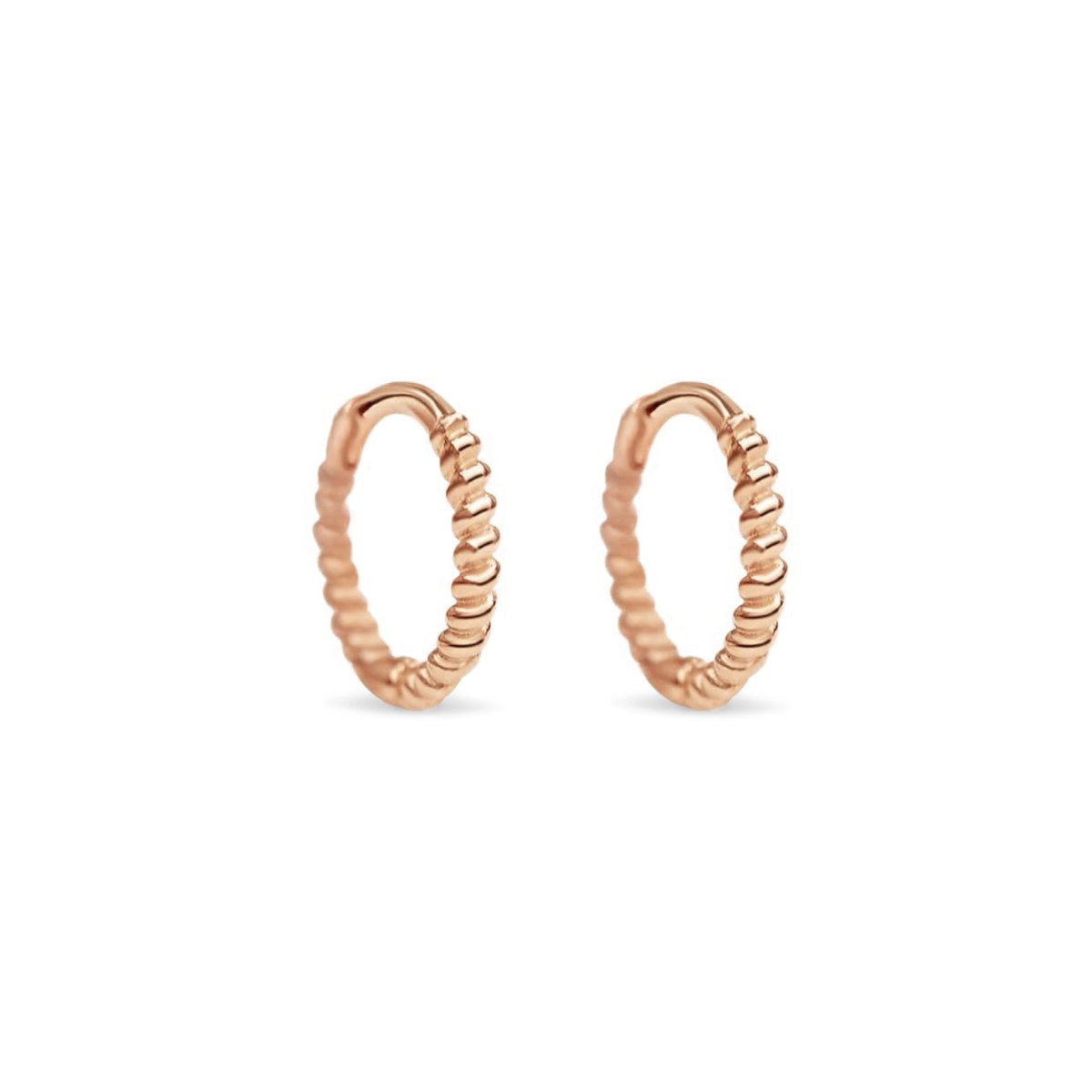 Pair of rose gold vermeil twisted rope huggie hoops, on a white background