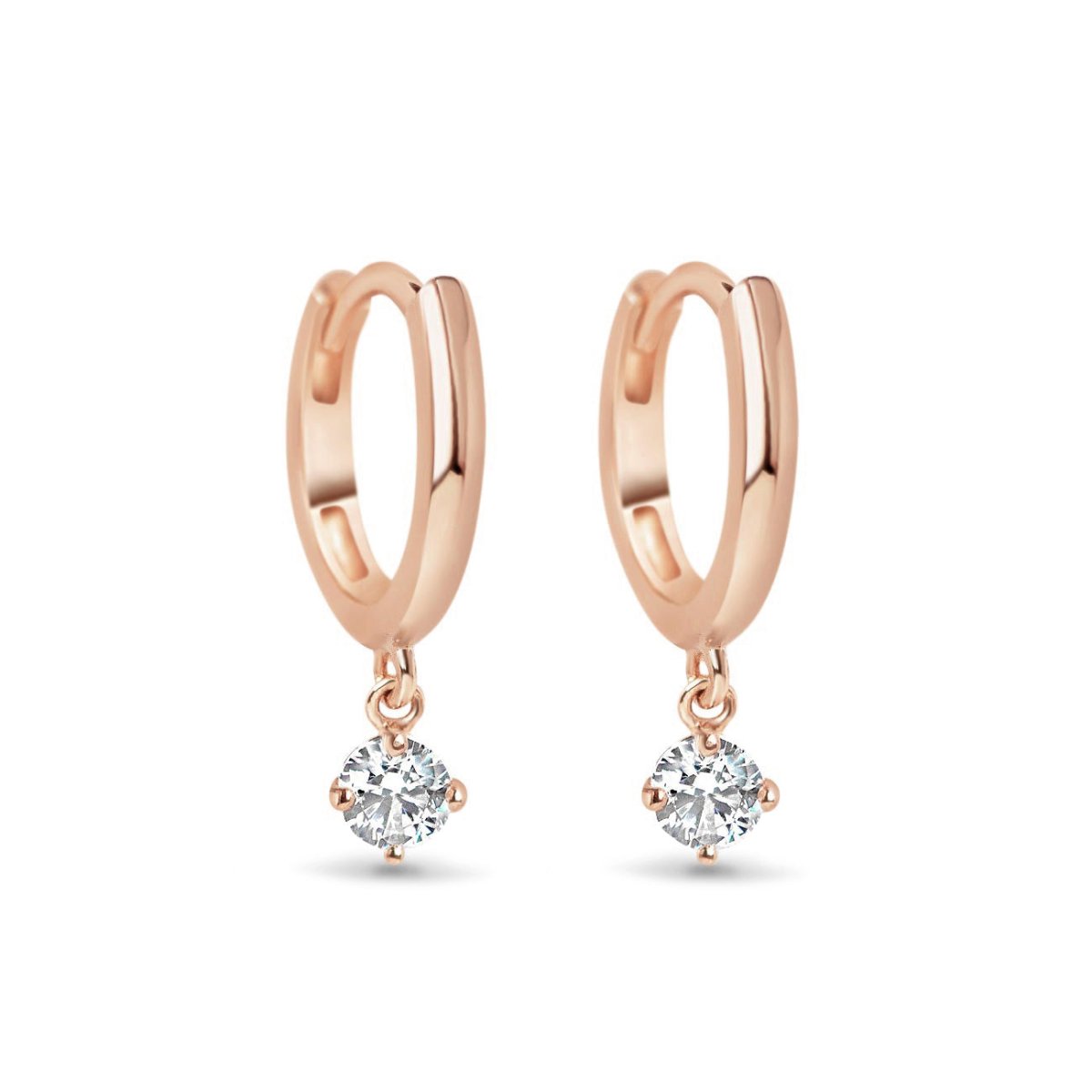 Pair of 14K rose gold huggie hoops with a round moissanite dangle, on a white background