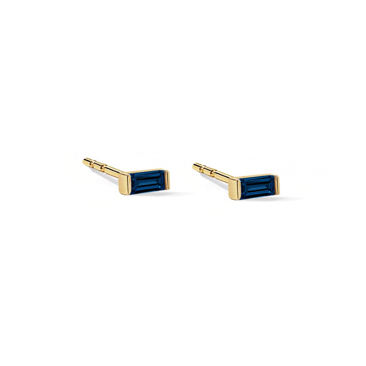 14K gold tiny baguette studs with a single blue rectangular stone, on a white background