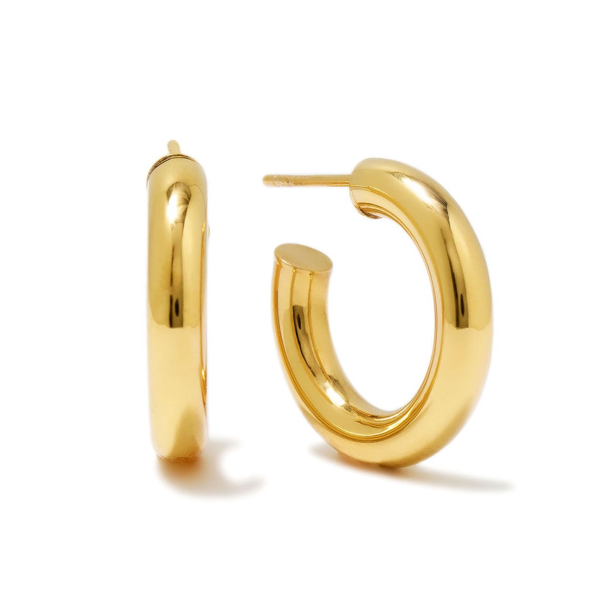 14K gold thick chunky hoop earrings with a polished tube, on a white background