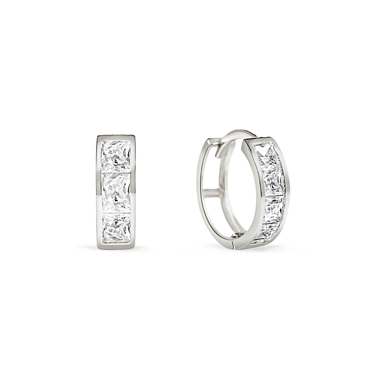 Pair of sterling silver huggie hoops with square clear stones, on a white background