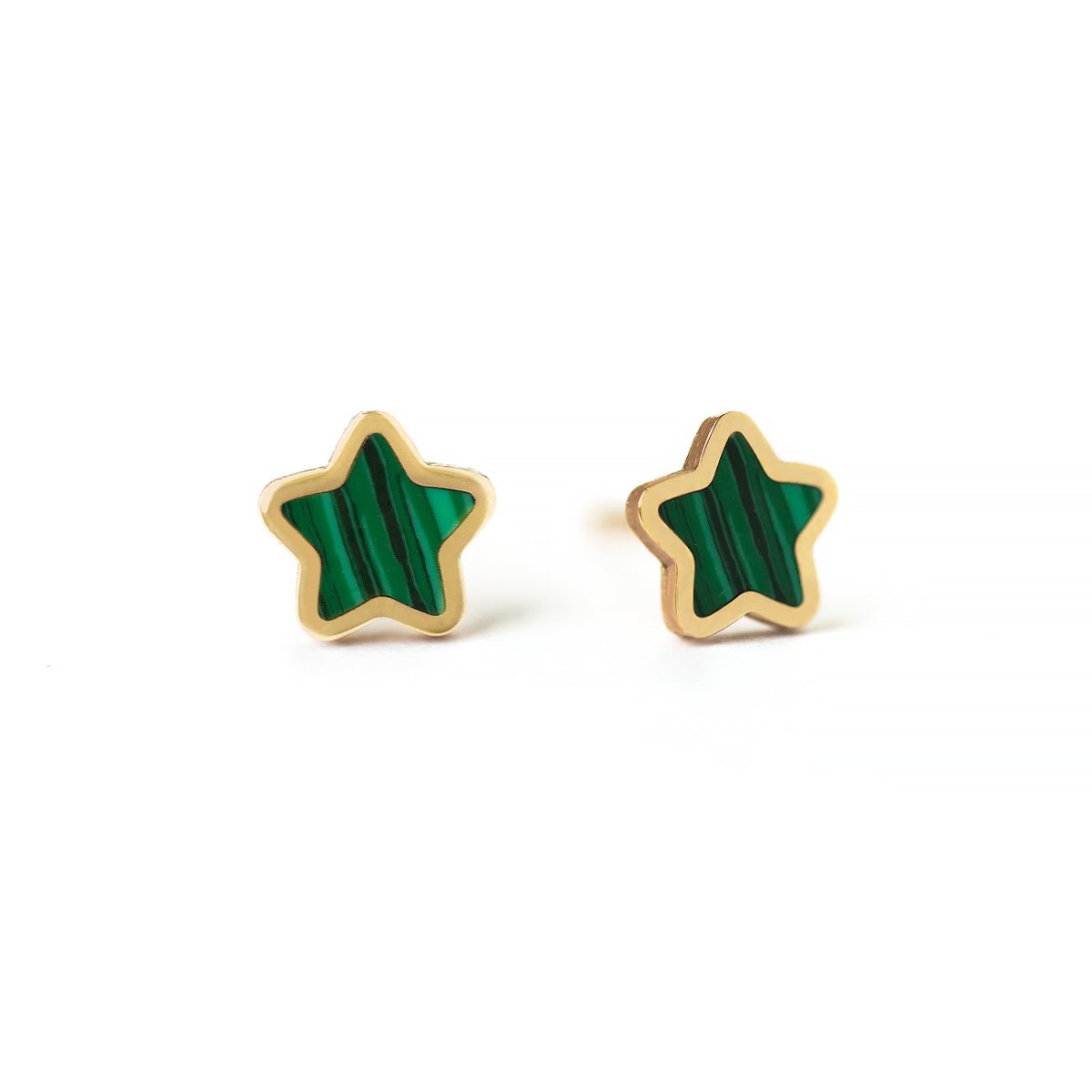 Pair of 14K gold star studs with striped green malachite centers, on a white background