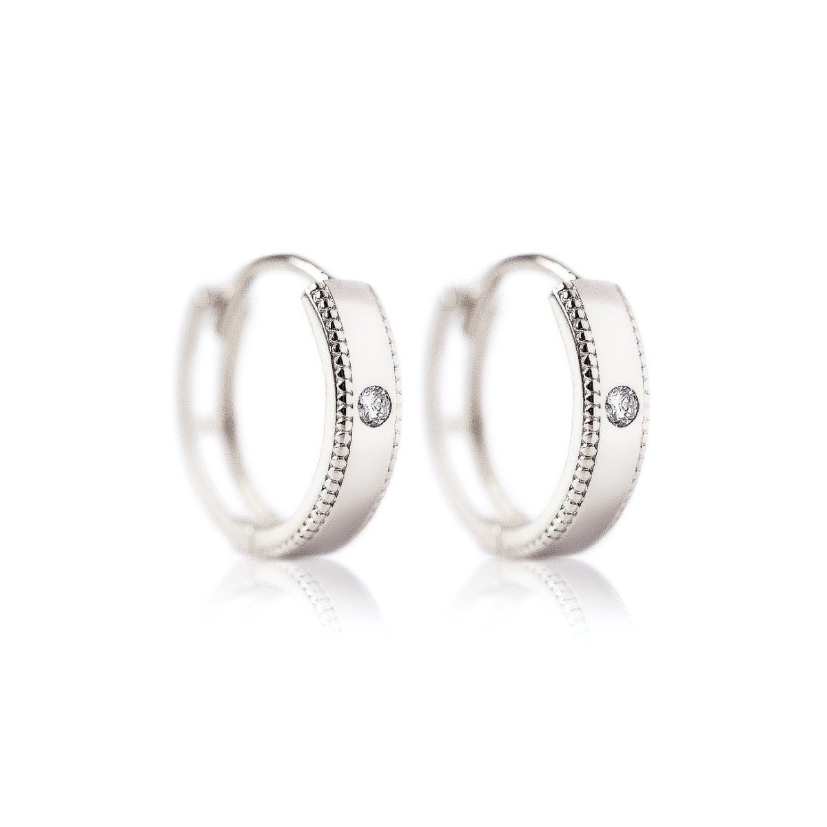 14K white gold milgrain band huggie hoops with a central white sapphire, on a white background