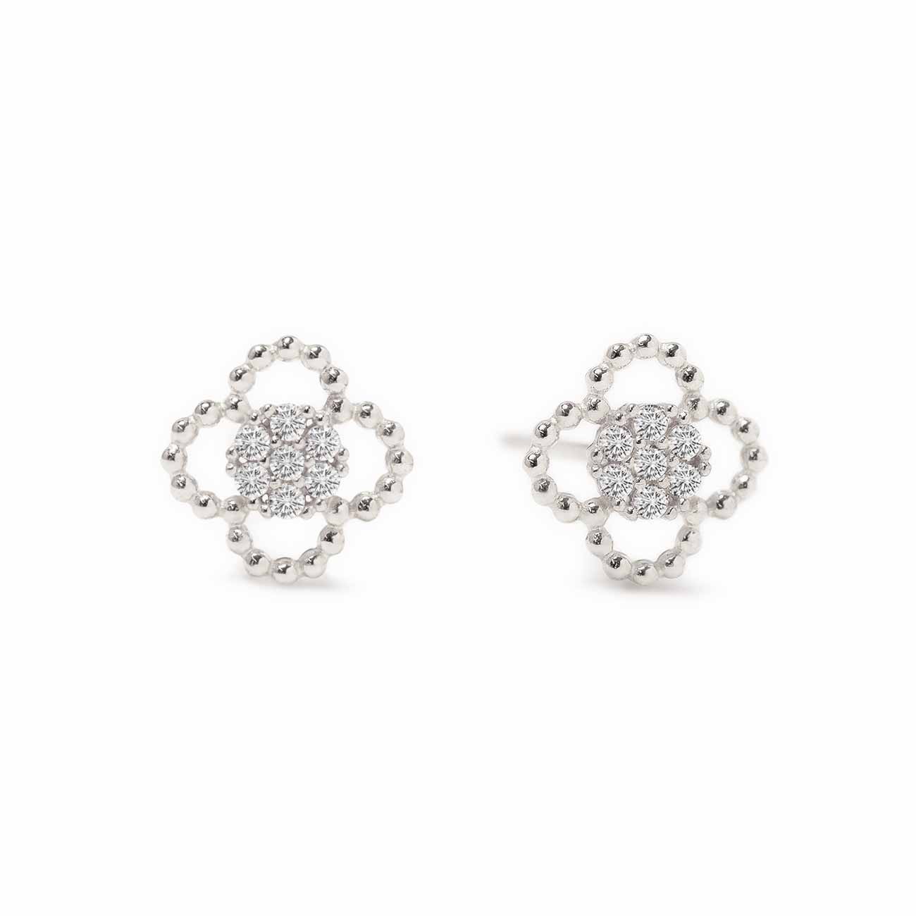 14K white gold clover studs with a beaded outline and pave white zirconia center, on a white background