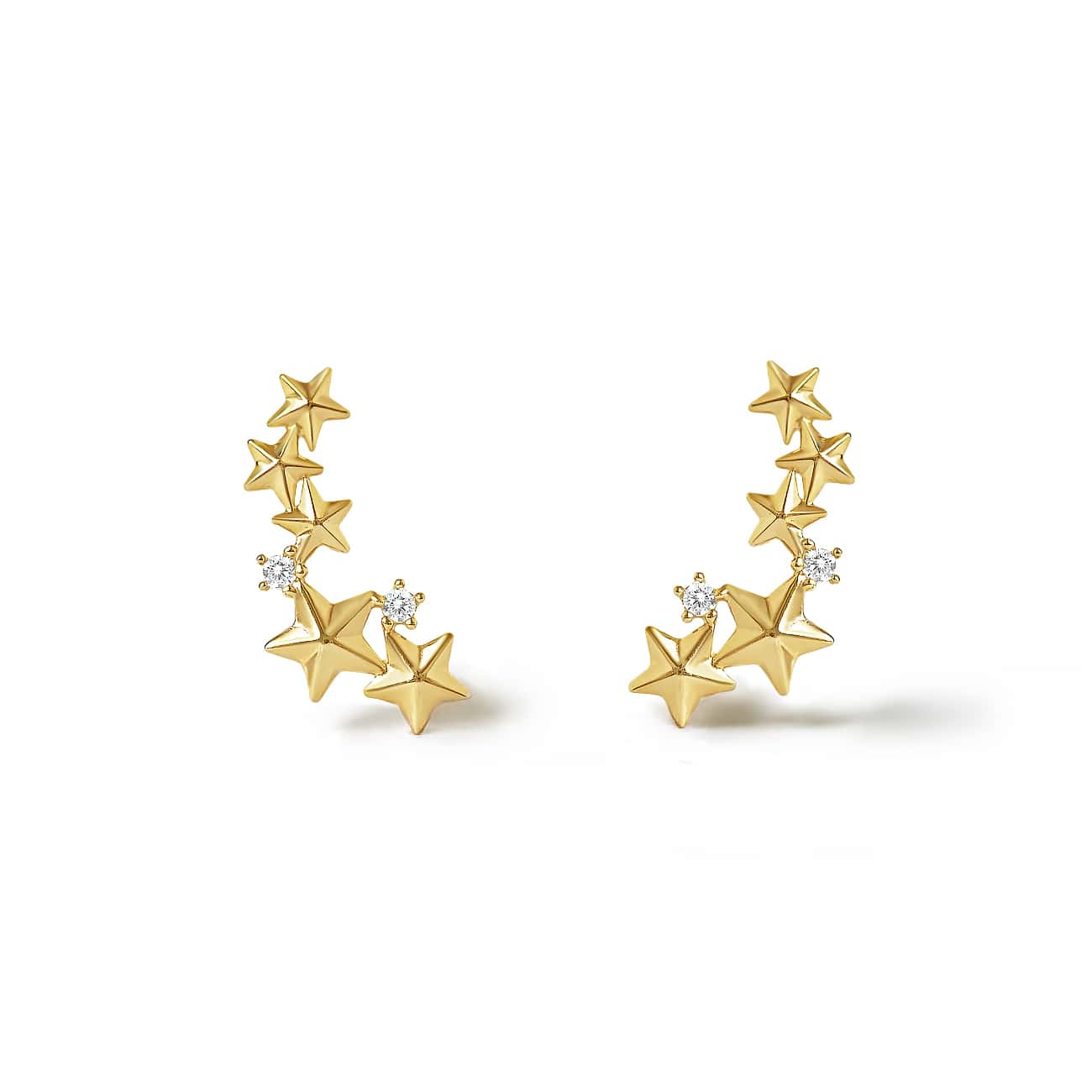 Pair of 14K gold star cluster studs with clear accent stones, on a white background