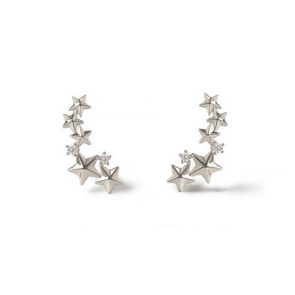 Pair of 14K white gold star cluster studs with clear accent stones, on a white background