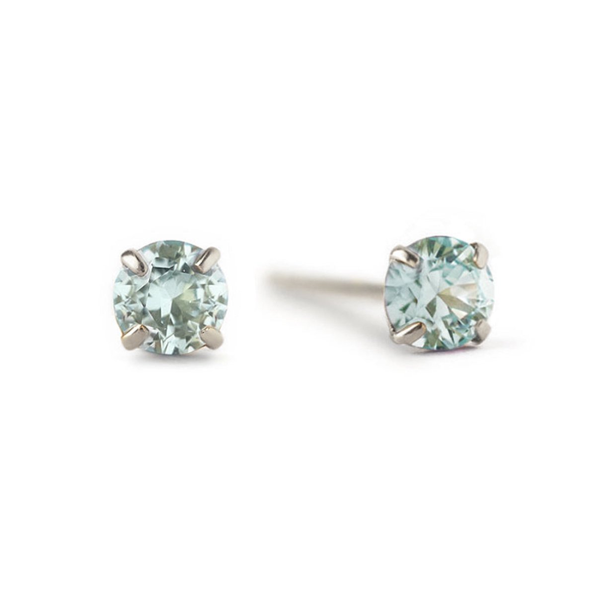 14K white gold prong-set aquamarine stud earrings with round pale blue stones, on a white background
