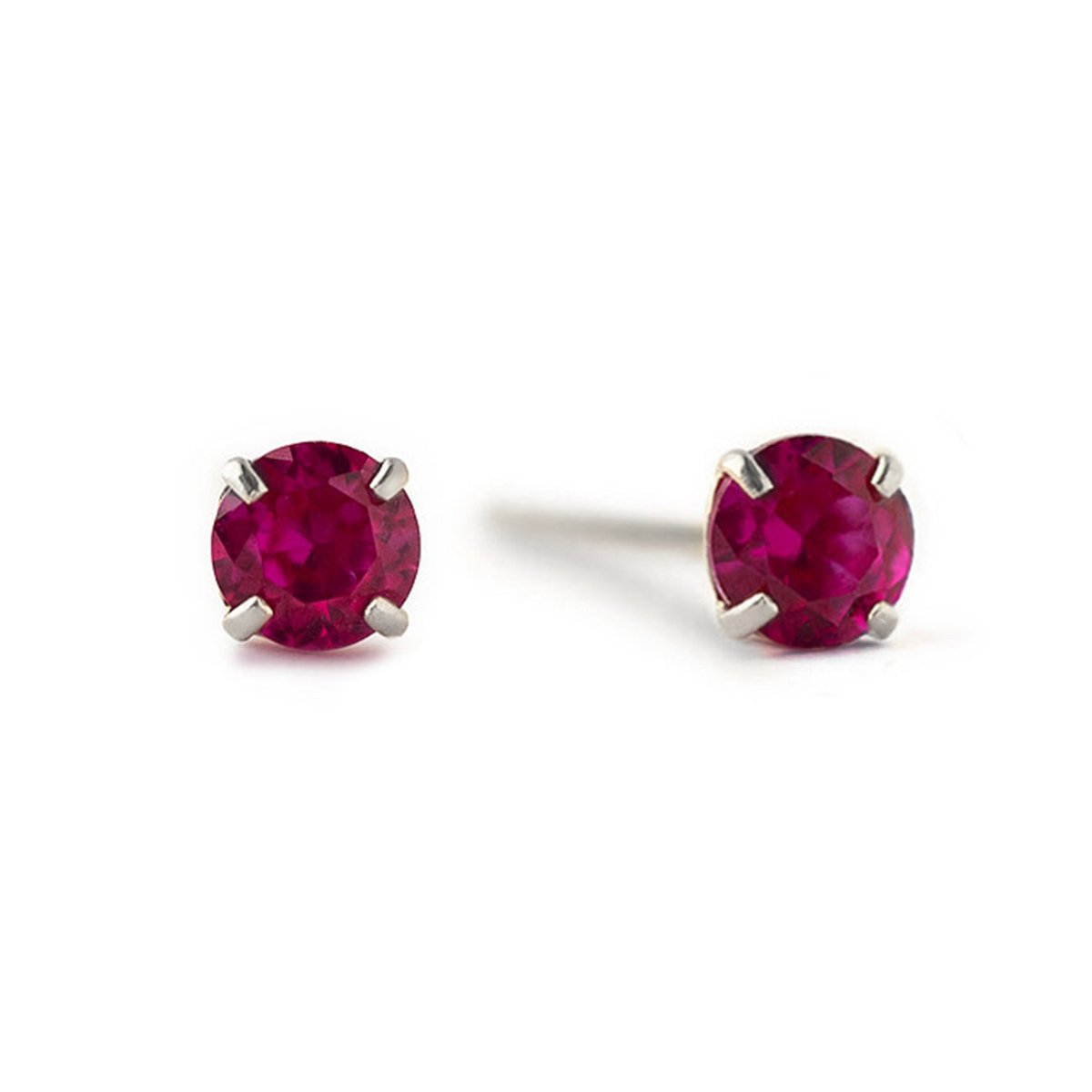 14K white gold ruby studs with round deep-red stones in four-prong settings, on a white background