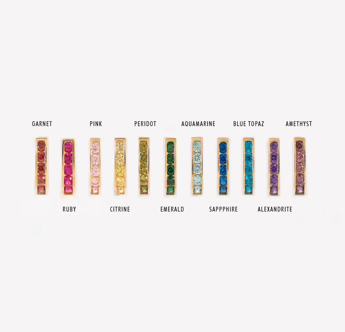 14K gold birthstone huggie color guide showing channel-set hoops in a range of stone colors