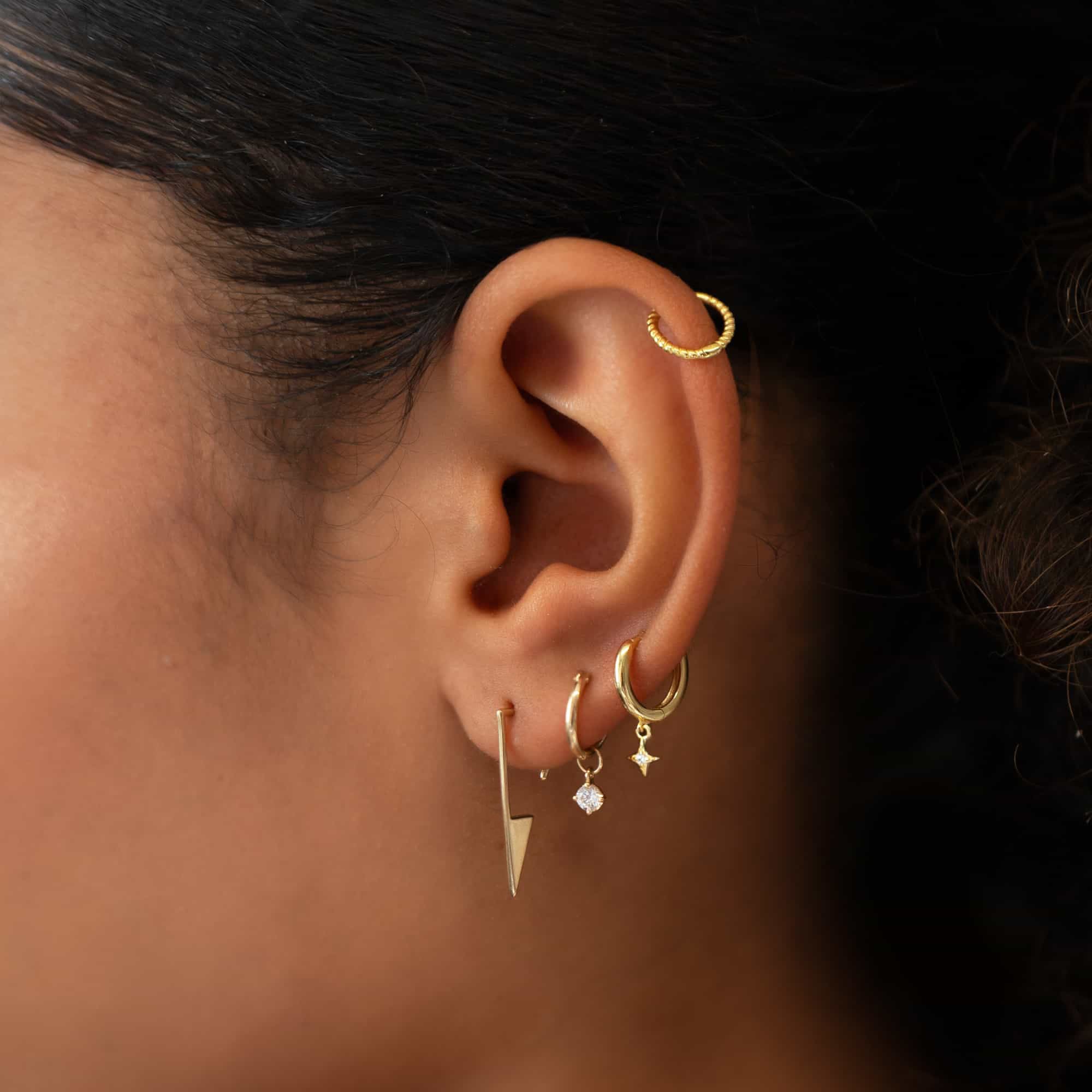 caption:model wearing size 8mm with charm