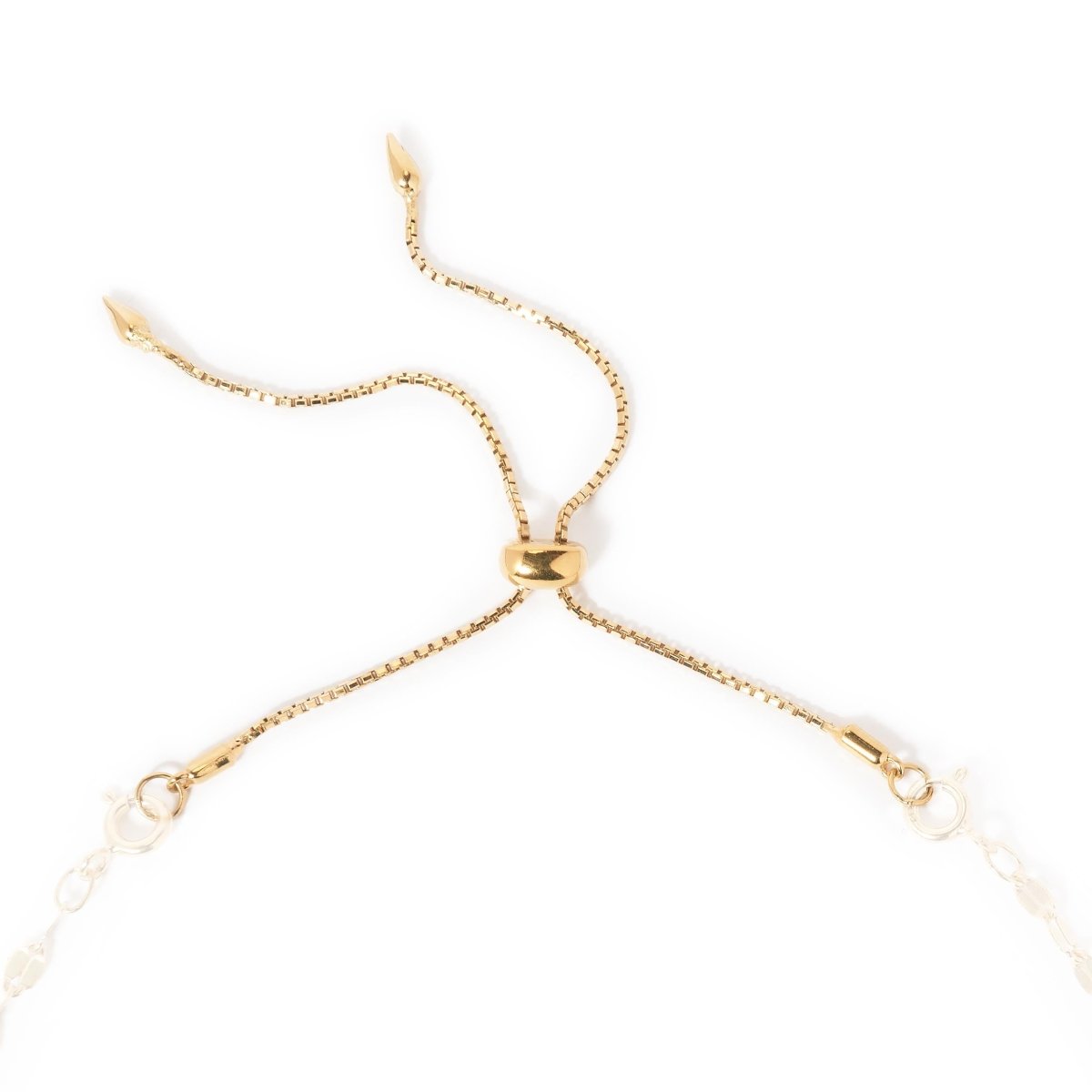 Gold vermeil box-chain necklace extender with a slider bead and spring-ring clasps, on a white background